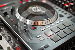 DJ playing mixing music on vinyl turntable