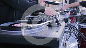 DJ playing music on a vinyl record player. DJ party stock futage