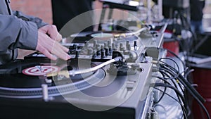 DJ playing music on a vinyl record player. DJ party stock futage