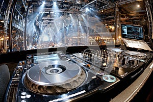 DJ setup overlooking a crowded dance floor