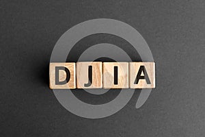 DJIA - acronym from wooden blocks with letters