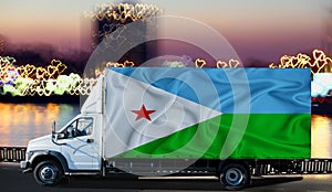 Djibouti flag on the side of a white van against the backdrop of a blurred city and river. Logistics concept