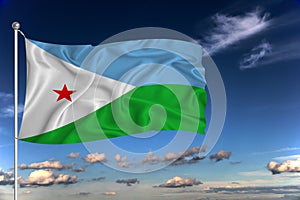 Djibouti national flag waving in the wind against deep blue sky.  International relations concept