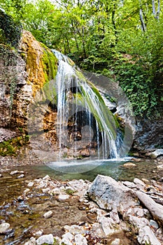 Djur-djur waterfall on Ulu-Uzen river in autumn