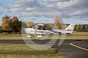 DLOUHA LHOTA, CZECH REPUBLIC - 11 Nov 2023. Cessna 172S Skyhawk SP takes off at the airport in Dlouha Lhota. The Cessna 172