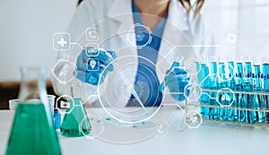 DNA molecule testing concepts. The doctor in a mask examines DNA molecules on the chemical laboratory with vr icon