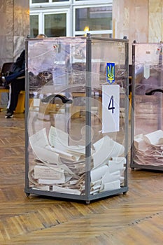 View of ballots in ballot box at vote station. Election of Ukraine President. Observers from different political parties monitor