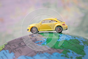 Dnipro, Ukraine - October 03, 2019: The car is located on the American continent of the world map. Concept of travel around world