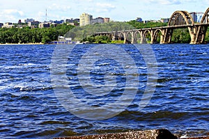 The beautiful arched bridge on the river Dnepr, Dnepropetrovsk, Ukraine.