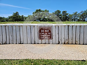 do not climb on cannons and fort wall sign