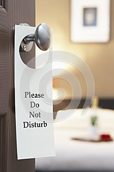 Do Not Disturb sign on hotel room's door