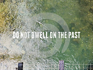 DO NOT DWELL ON THE PAST. Inspirational and motivational quote. Stock photo. photo