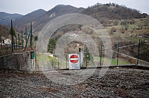 Do Not Enter road sign with inscription Proprieta Privata means Private Property from italian photo