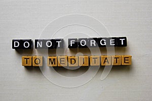 Do not Forget to Meditate on wooden blocks. Business and inspiration concept