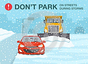 Do not park your car on streets during storms. Snow plow truck is clearing snow away on winter road.