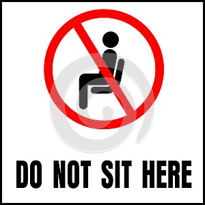 Do not sit here sign for public places to encourage social distancing photo