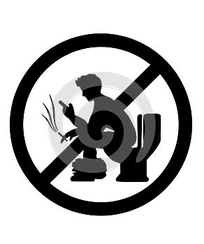 Do not smoke or use the phone in the toilet. photo