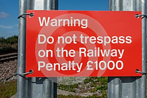 Do not trespass on the railway warning sign photo