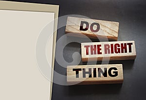 Do the right thing words on wood blocks. Professional skills concept.