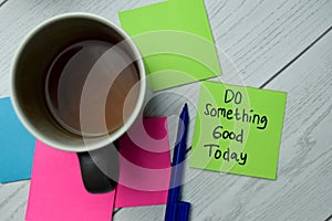 Do Something Good Today write on sticky notes isolated on office desk