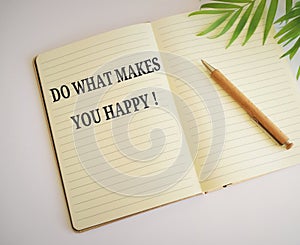 Do what makes you happy symbol. Notebook with words Do what makes you happy. Business, do what makes you happy concept