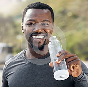 Do whatever is good for you. Shot of a man drinking water while out for a workout.