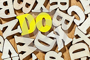 Do word by yellow wooden letters