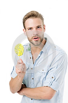 Do you know. Impressing fact harmful sugar nutrition. Man handsome bearded guy holds lollipop candy. Man with lollipop