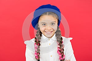 Do you speak french. Fancy style. Little girl with braids ready for school. School fashion concept. Schoolgirl wear