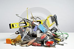 Do it yourself tools in pile on white background