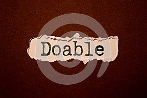 doable colorful word on the wooden background