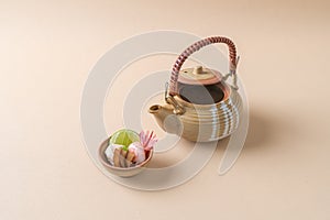 dobin mushi - steamed matsutake mushroom and pike conger with Japanese broth in an earthenware teapot photo