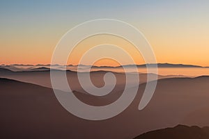 Dobratsch - Panoramic sunrise view from Dobratsch on High Tauern and Nocky Alps in Austria