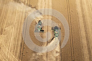 Dobrich, Bulgaria - July 03, 2022: Modern John Deere combine harvesting grain in the field near the town Dobrich, Bulgaria July 03