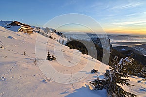 Dochia chalet on mountain in winter