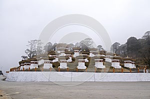 Dochu La Pass with 108 stupas or chortens, built on a central hillock, along the east-west road from Thimpu to Punakha, Bhutan