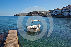 Dock and boat in Cadaques Bay