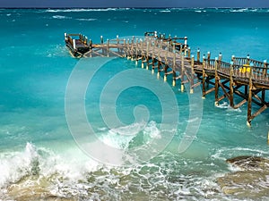 A dock in the Caribbean Sea on a windy day