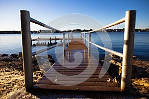 Dock on a cold morning at Lake Granbury at a small beach near the downtown square