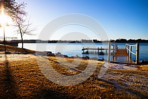 Dock on a cold morning at Lake Granbury at a small beach near the downtown square