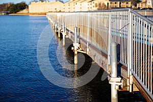 Dock on a cold morning at Lake Granbury at a small beach near the downtown square