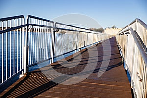 Dock on a cold morning at Lake Granbury at a small beach near the downtown square