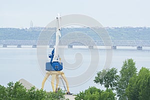 Dock cranes with industrial buildings and big