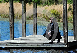 Dock and Handsome Man in Dress Suit