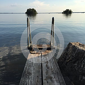 Dock at lake HjÃ¤lmaren, Sweden.