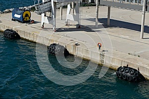 Dock with large buoys with tires