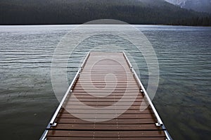 dock leading out of the lake