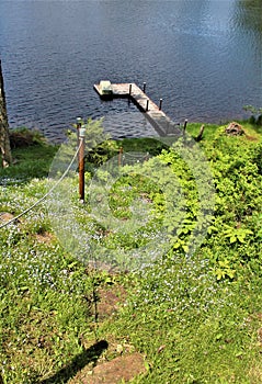 Dock at Leonard Pond located in Childwold, New York, United States