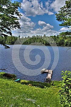 Dock at Leonard Pond located in Childwold, New York, United States