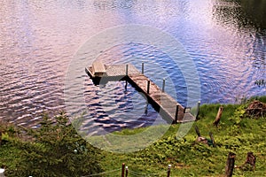 Dock at Leonard Pond located in Childwold, New York, United States